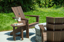 Load image into Gallery viewer, Heathered teak Monterey outdoor side table holding wine bottle, glasses, and snacks beside Adirondack chair