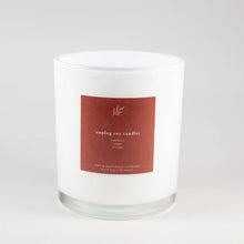 Load image into Gallery viewer, White soy candle with terracotta label featuring oakmoss, sage, and orange scent