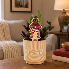 Load image into Gallery viewer, Indiana University Bison mascot plant stake in wooden planter with green plants