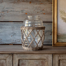Load image into Gallery viewer, Clear glass jar with woven wicker basket holder displaying rustic farmhouse style