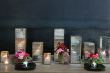 Load image into Gallery viewer, Vintage mercury glass lanterns in various sizes displayed with pink flowers and candles
