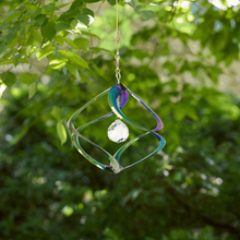 Load image into Gallery viewer, Rainbow metal garden spinner with crystal ball hanging from tree branch outdoors