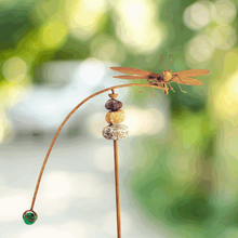 Load image into Gallery viewer, Decorative dragonfly garden stake with balancing stones and green counterweight on curved wire