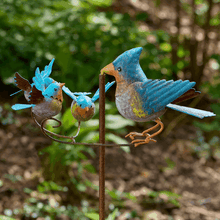 Load image into Gallery viewer, Metal garden balancer sculpture featuring three decorative blue birds on rustic bronze pole