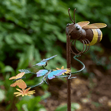 Load image into Gallery viewer, Metal garden balancer sculpture featuring bee and colorful butterflies on curved wire stems