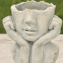 Load image into Gallery viewer, Weathered concrete planter shaped like cupped hands with serene face design