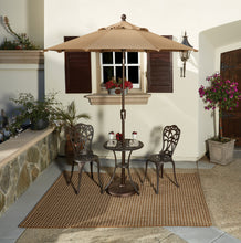 Load image into Gallery viewer, Tan octagonal patio umbrella with push button tilt over outdoor bistro table and chairs