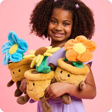 Load image into Gallery viewer, Child holding three plush flower pot toys with colorful fabric flowers against pink background