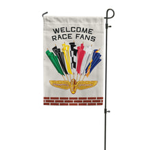 Load image into Gallery viewer, Welcome Race Fans garden flag with colorful racing flags and Indianapolis Motor Speedway logo on pole