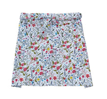 Load image into Gallery viewer, Floral patterned gardening half apron with colorful botanical design on light blue background