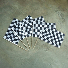 Load image into Gallery viewer, Five small checkered racing flags with wooden sticks arranged in fan pattern on concrete surface