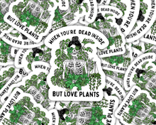 Load image into Gallery viewer, Humorous skeleton with plants sticker saying When You're Dead Inside But Love Plants