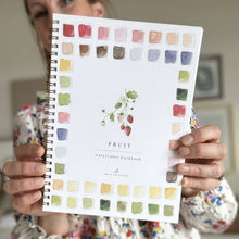 Load image into Gallery viewer, Spiral-bound watercolor workbook with fruit theme showing color palette swatches and strawberry illustration