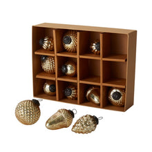 Load image into Gallery viewer, Set of twelve gold mercury glass Christmas ornaments in nature-inspired shapes displayed in kraft box