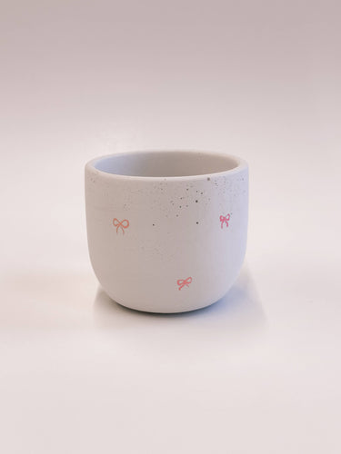 Pink Bow Planter With Drainage Hole: Raw Concrete 4