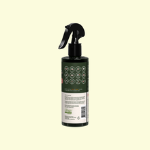 Load image into Gallery viewer, Black spray bottle of Protect Organic Leaf Spray with circular icons and white label