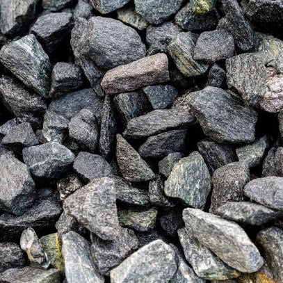Xylem Black Granite Stones for Elegant Landscaping – Wasson Nursery Xylem Black Granite Stones for Elegant Landscaping – Wasson Nursery