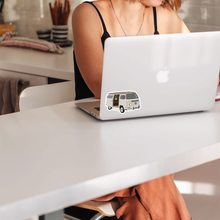 Load image into Gallery viewer, Retro plant van sticker on white laptop back with woman typing at desk