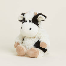 Load image into Gallery viewer, Plush black and white cow stuffed animal toy with pink hooves sitting upright