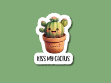 Load image into Gallery viewer, Cute cartoon cactus sticker with smiling face in terracotta pot saying Kiss My Cactus