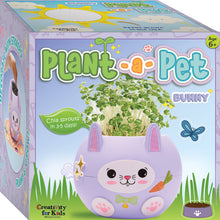 Load image into Gallery viewer, Plant-a-Pet bunny-shaped planter kit with chia sprouts growing from purple ceramic container