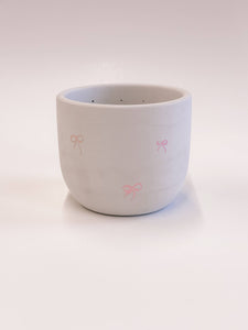 Pink Bow Planter With Drainage Hole: Raw Concrete 4"