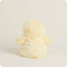 Load image into Gallery viewer, Cream colored plush chick stuffed animal with fluffy fur texture against beige background