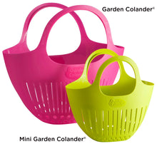 Load image into Gallery viewer, Pink and green plastic garden colanders with drainage holes and carrying handles