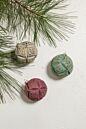 Load image into Gallery viewer, Two embossed velvet Christmas ornaments in green and burgundy red with geometric patterns