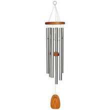 Load image into Gallery viewer, Large silver wind chime with wooden top and bottom pieces hanging vertically