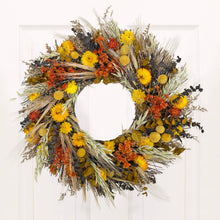 Load image into Gallery viewer, Santa Barbara Harvest Wreath featuring dried yellow daisy, orange blooms, wheat, and eucalyptus on white door