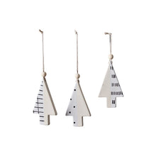 Load image into Gallery viewer, Set of three white wooden Christmas tree ornaments with black Nordic-inspired patterns on twine hangers