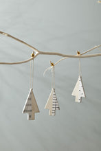 Load image into Gallery viewer, Three white ceramic Christmas tree ornaments with black patterns hanging from a white branch