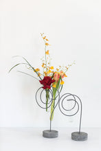 Load image into Gallery viewer, Modern metal flower stand with spiral design holding glass test tubes for small floral arrangements