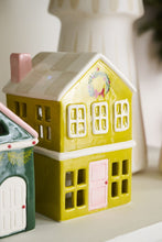 Load image into Gallery viewer, Ceramic yellow-green two-story Christmas village house figurine with pink door and wreath detail