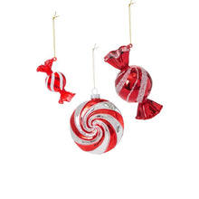 Load image into Gallery viewer, Three red and white striped candy-shaped Christmas ornaments hanging on gold hooks