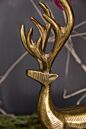 Load image into Gallery viewer, Gold metallic reindeer figurine with ornate antlers, festive Christmas holiday decoration